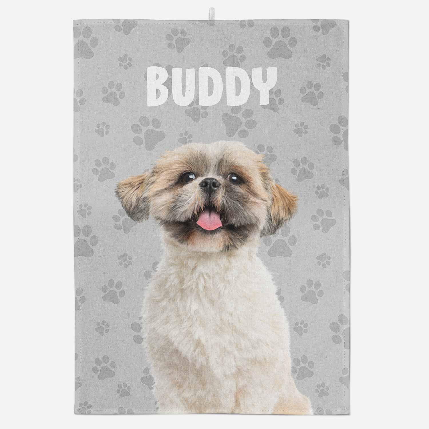 Dog with 'Buddy' text on a gray background with paw prints