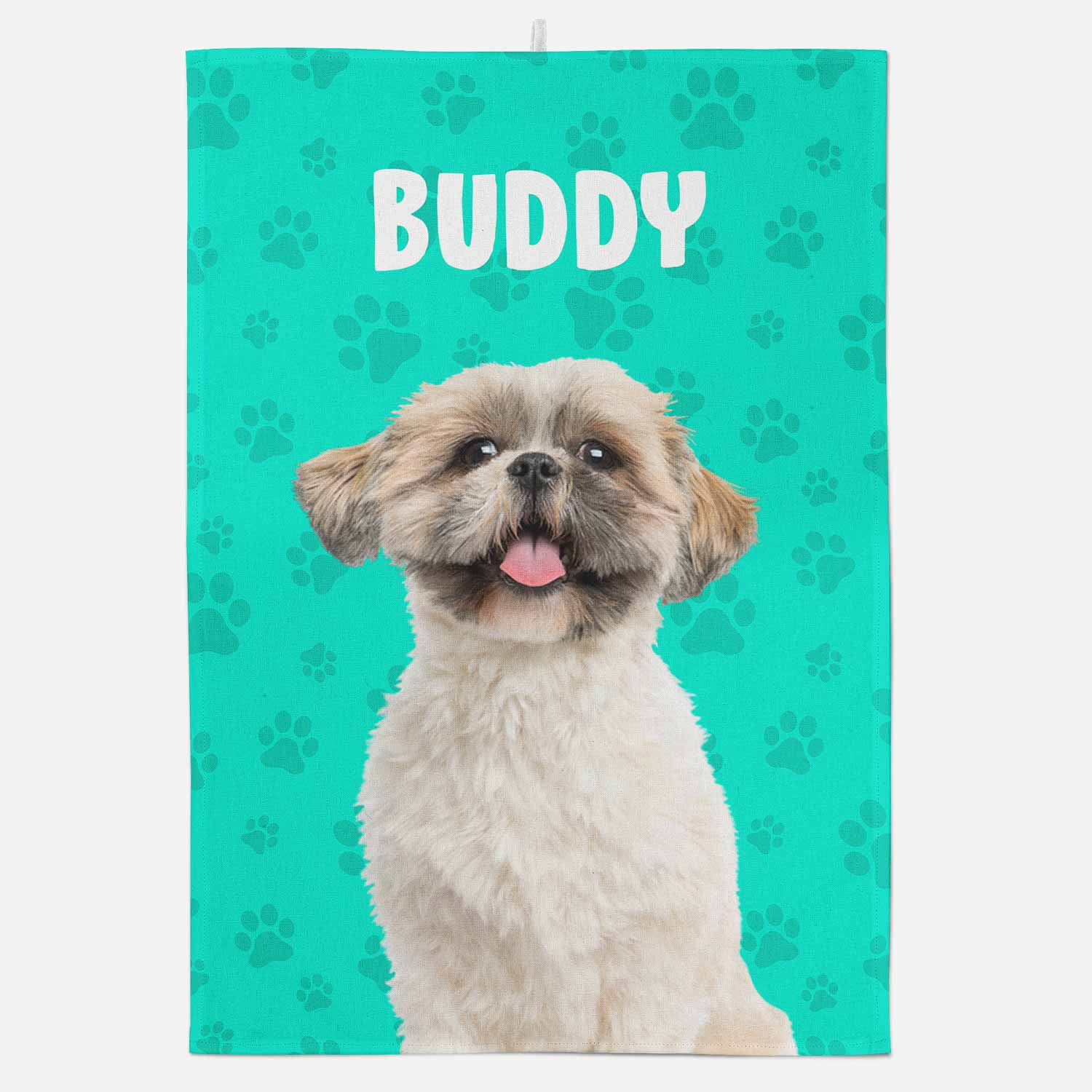Dog towel with a dog's face and 'Buddy' text on a teal background with paw prints