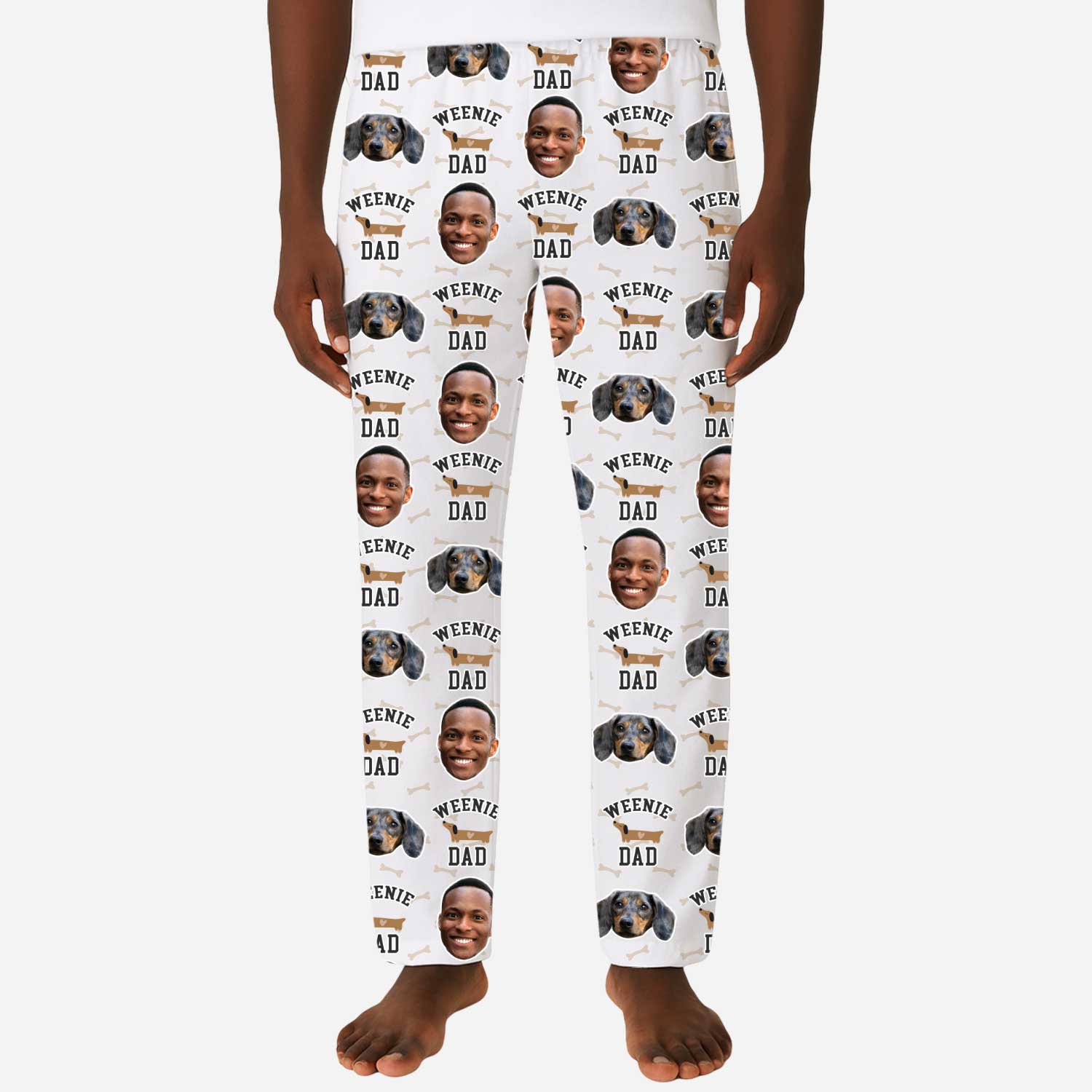 Pajama pants with a pattern of faces and text on a white background