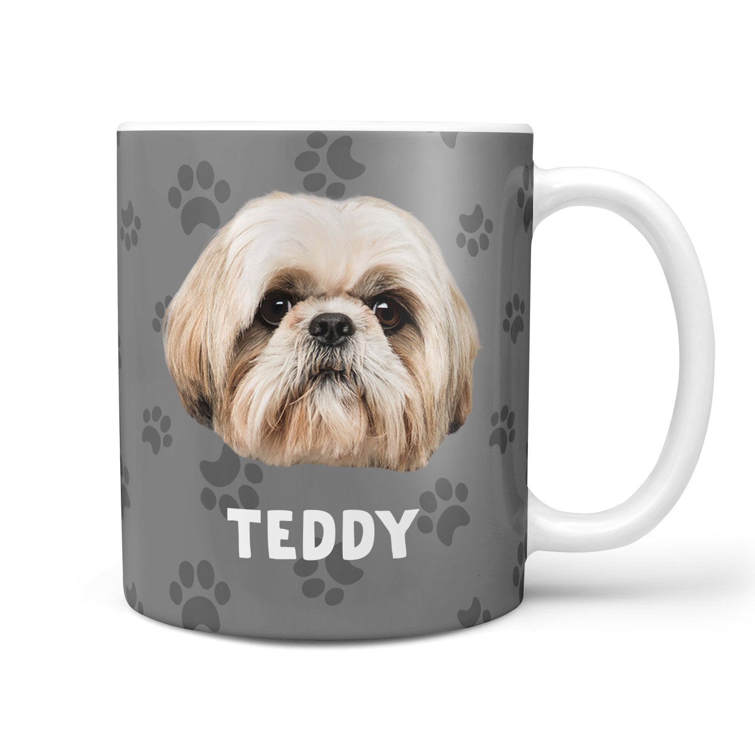 Mug with a dog's face and name 'Teddy' on a gray background with paw prints
