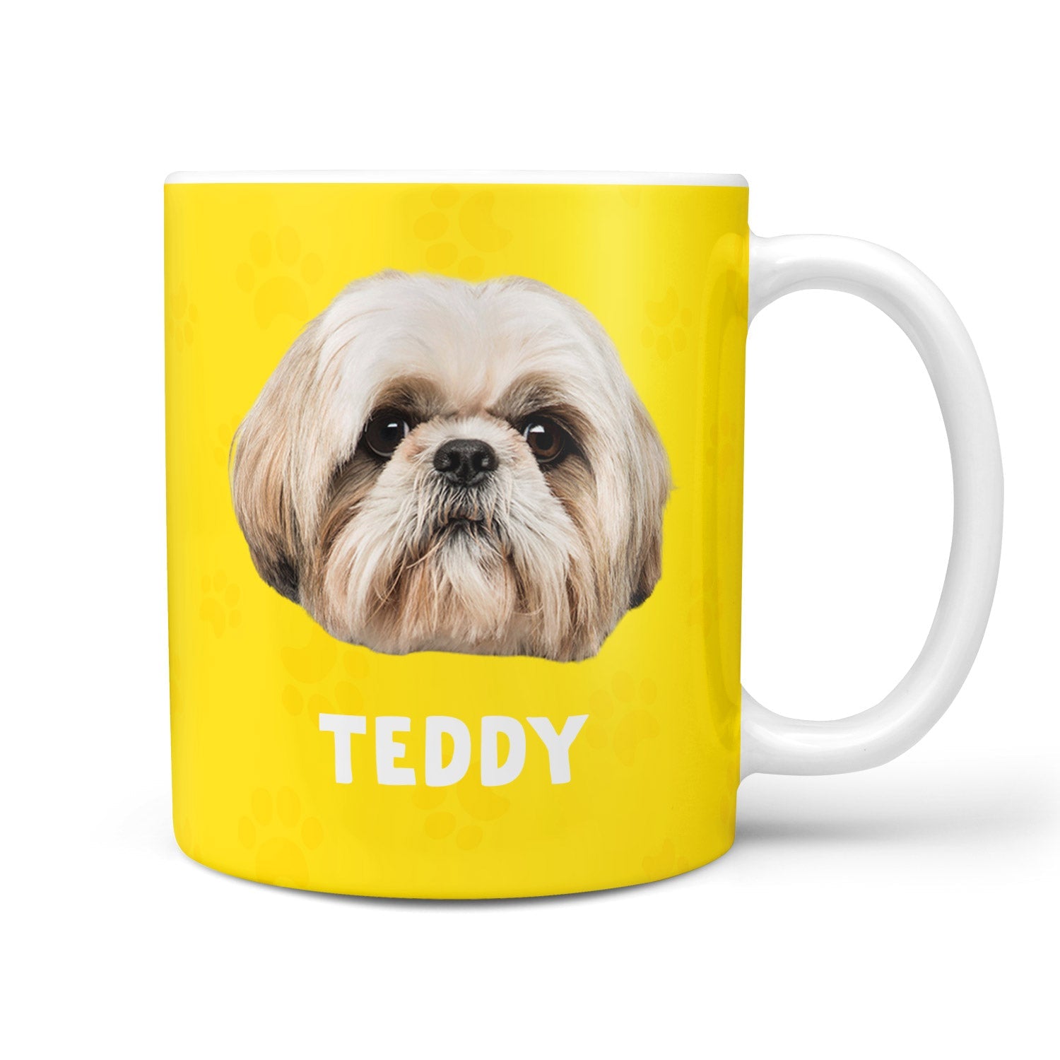 Yellow mug with a dog's face and name 'Teddy' on a white background